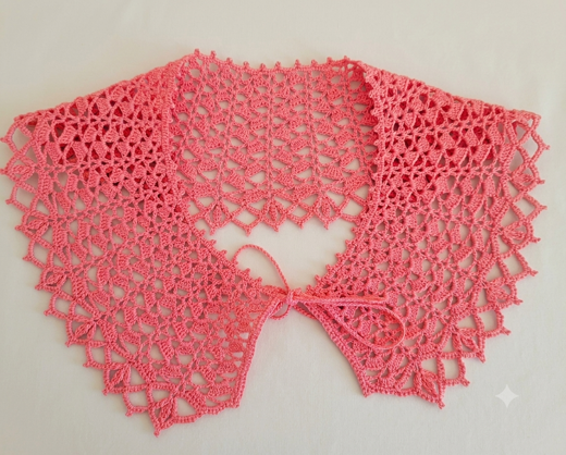 A delicate pink lace collar.